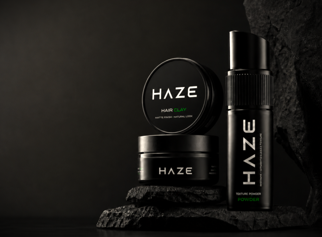 Barber finishing a fade at HAZE HAIRCRAFT